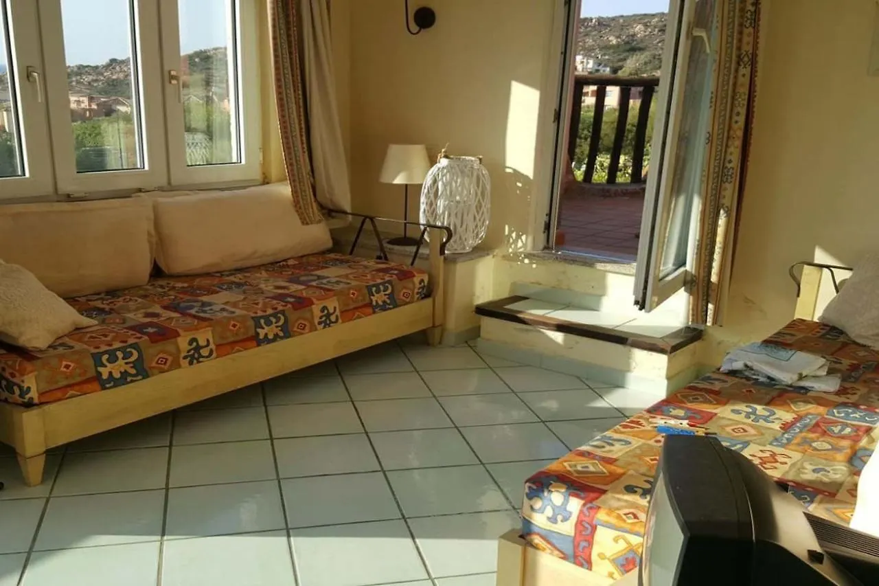 Dom wakacyjny Un Angolo Di Paradiso A Pochi Passi Dal Mare Nel Villaggio Calarossa Isola Rossa